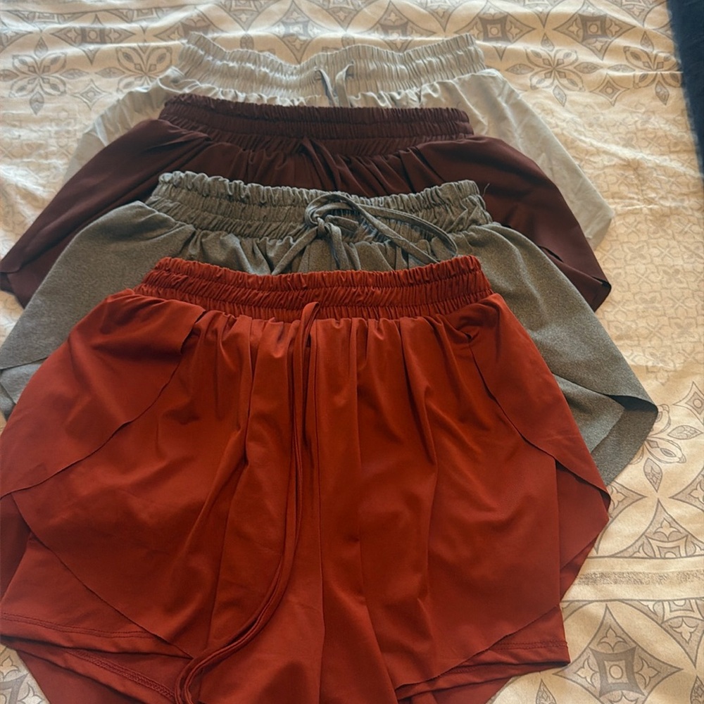 4 pairs of Altar’d State butterfly shorts
